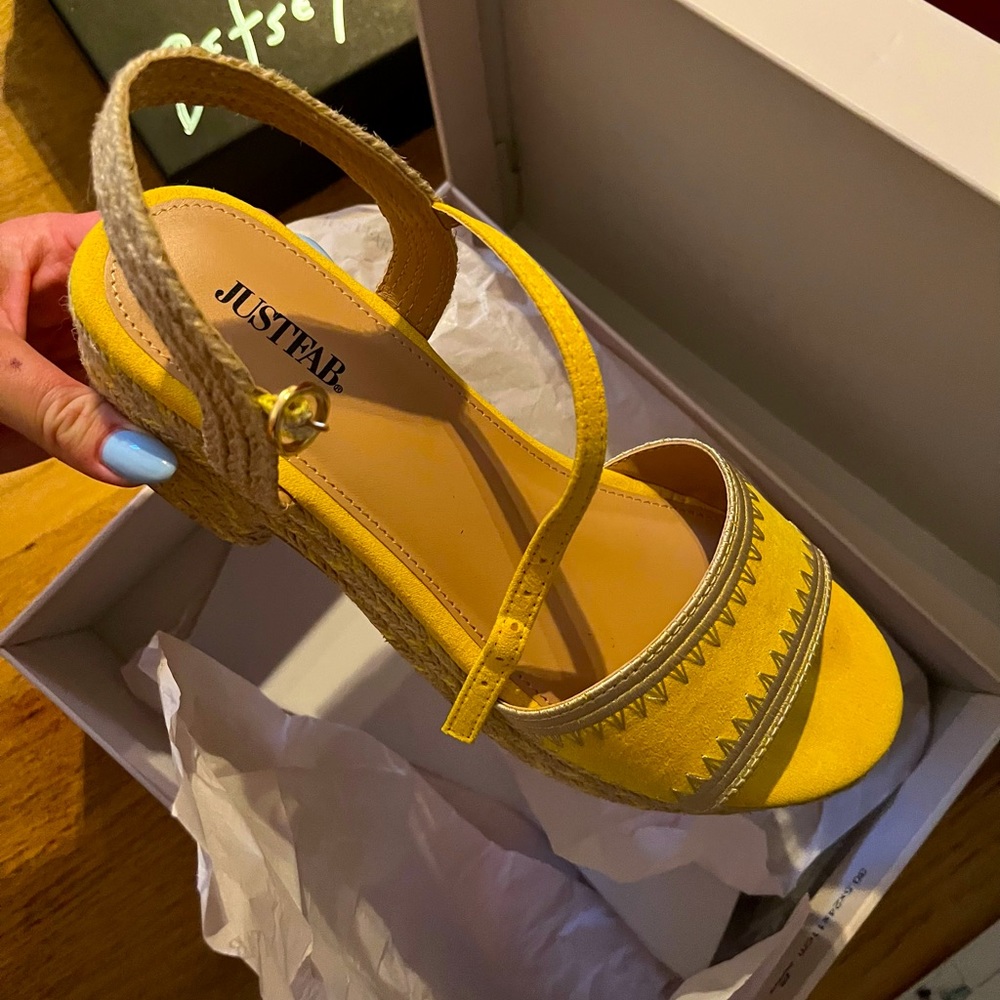 Yellow Espadrille’s from Just Fab. Never worn, brand new! Size 7.